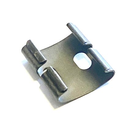 Příchytka-pružina skla předního světla Felicia-Octavia